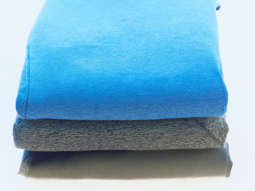 Folded performance activewear fabric in cool tones